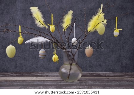 Easter composition, Easter tree decorated with eggs and feathers.