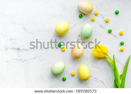Easter concept eggs with tulip top view pattern