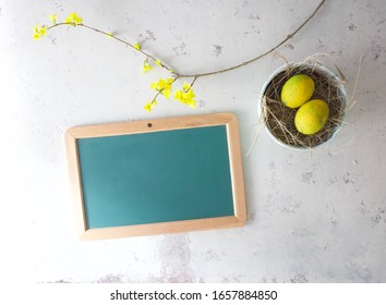 Easter Concept Picture With Yellow Flowers And Eggs. Copy Space For Greeting, Opening Hours, Menu Or Any Inspirational Message. Happy Easter Holiday!