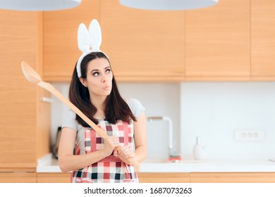 Easter Cook With Bunny Ears And Huge Wooden Spoon. Party Host Stressed About Organizing Holiday Party 
