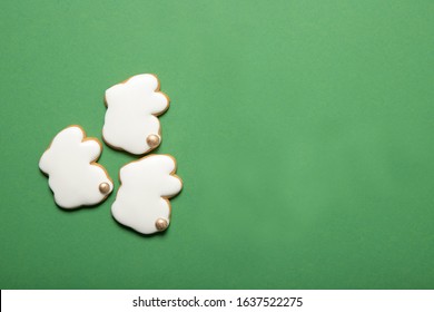 Easter cookies on a green background. Place for text. In the shape of a rabbit. - Shutterstock ID 1637522275