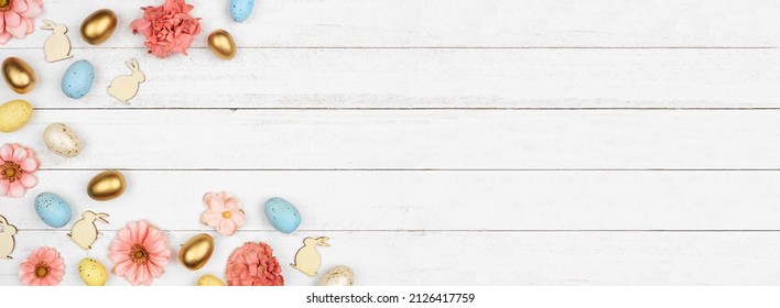 Easter Corner Border With Eggs, Paper Flowers And Wooden Bunnies. Top Down View Against A White Wood Banner Background. Copy Space.