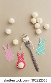 Easter Craft Of Making Yarn Pom Pom Bunny Tail With A Fork.