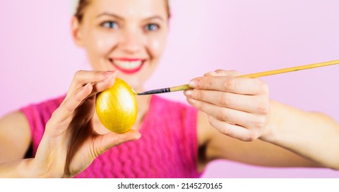 Easter Day Celebration. Smiling Woman Painting Eggs. Easter Egg Decorating Ideas.