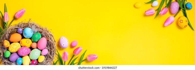 Easter - Decorated Eggs In Nest With Pink Tulips On Yellow Background - Powered by Shutterstock