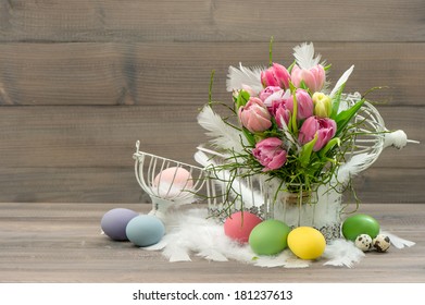 Easter Decoration With Vintage Cage, Eggs And Pink Tulip Flowers. Romantic Home Interior. Retro Style Colored Picture