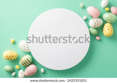 Easter delight scene: top view colorful eggs on a turquoise base, providing a perfect circular space for your text or promotion