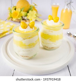 Easter dessert in jars with whipped cream and pudding glaze with the addition of eggnog.