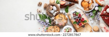 Easter desserts  table.  Sweet easter holiday concept with holiday decorations. Top view, copy space, panorama, banner