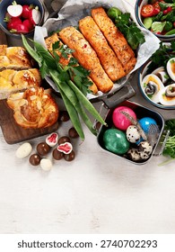 Easter dinner on a light background. Traditional food. Family spring event. Top view.