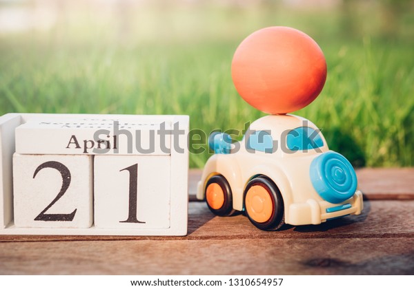 Easter egg and Car on garden grass background,\
Happy easter day concept