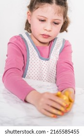 Easter Egg Coloring. Painting Easter Eggs With Gold Luster.