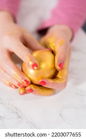 Easter Egg Coloring. Painting Easter Eggs With Gold Luster.