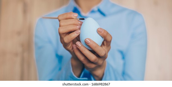 Easter Egg. Hand Painting Eggs On Wooden Table. It Is Colorful.
