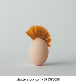 Easter Egg With Mohawk Hair. Flat Lay. Minimal Concept.