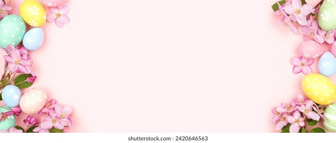 Easter eggs and cherry blossom flowers. Above view double border against a soft pink banner background. Copy space. - Powered by Shutterstock