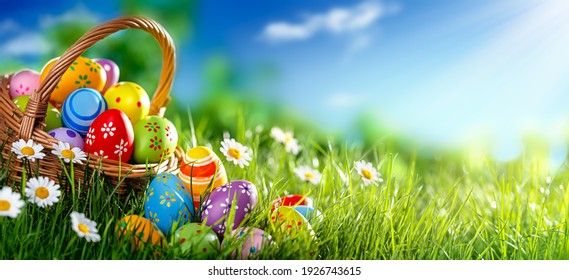 Easter eggs decorated with flowers in the grass - Powered by Shutterstock