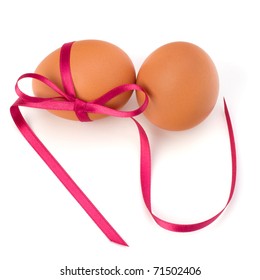 Easter eggs with festive bow isolated on white background