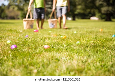 easter eggs hunt. Blurred silhouettes of children with baskets in hands. the concept of family fun at Easter.  blurred background. Cope space for your text - Shutterstock ID 1213301326
