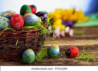 Easter eggs and  natural wooden country table, background and texture - Powered by Shutterstock