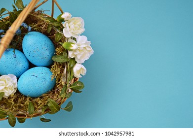 Easter. Easter eggs in the nest are viewed from above. A gentle Easter background. Template postcards.