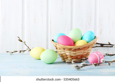 Easter eggs on a blue wooden table