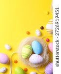 Easter eggs on a colored background, festive background . Vertical photo format	