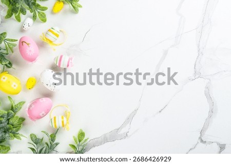 Easter eggs on white background. Flat lay image with copy space.