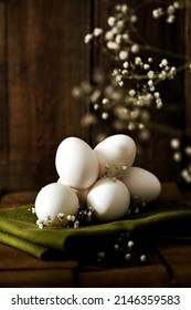 Easter Eggs On A Wooden Background. White Eggs. White Eggs On A Green Cloth Napkin.