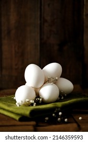 Easter Eggs On A Wooden Background. White Eggs. White Eggs On A Green Cloth Napkin.