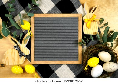 Easter Farmhouse Theme Product Flatlay Mockup With Buffalo Plaid And Wood Bunnies. Letterboard Felt Message Notice Board Mock Up With Negative Copy Space For Your Text Or Design Here.