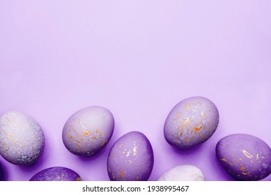 Easter frame of eggs painted in purple color. - Powered by Shutterstock