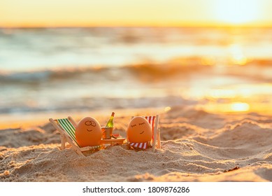 easter funny eggs relaxing on a beach.