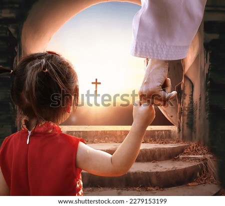 Easter and Good Friday concept, Jesus holding child's hand with empty tomb of Jesus Christ at cross on sunset background