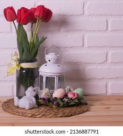 Easter Home Interior. Spring Flowers In A Vase And Easter Eggs