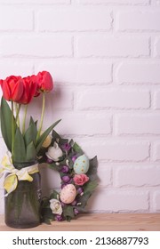 Easter Home Interior. Spring Flowers In A Vase And Easter Eggs