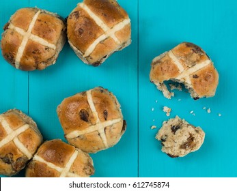 Easter Hot Cross Buns Against A Blue Background