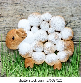 Easter Lamb Cake In A Green Grass On Wooden Background Top View