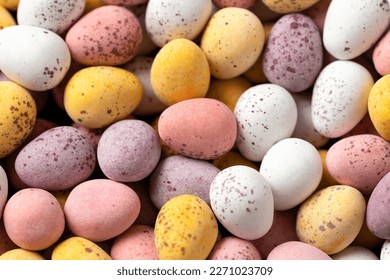 Easter mini eggs, chocolate candy in wooden bowl - Powered by Shutterstock
