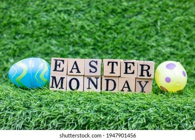 Easter Monday With Eggs Decoration On Green Grass. It Is The Day After Easter Sunday And Is A Public Holiday In Some Countries. It Is The Second Day Of Eastertide. In Western Christianity, 