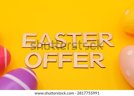 easter offer write between easter eggs on yellow background 