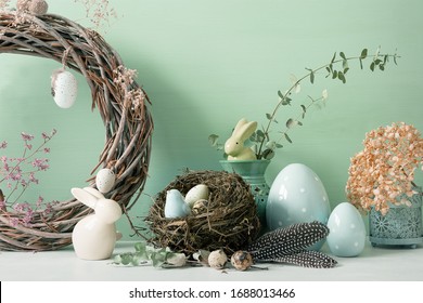 Easter ornaments in light and pastel colors with clear light, with eggs and rabbits, ornaments for the home, interior, bird nest with eggs inside - Powered by Shutterstock