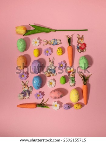 Easter pattern squer shape made of colorful flowers, eggs, bunnies and carrots. Minimal holiday concept. Flat lay pattern.