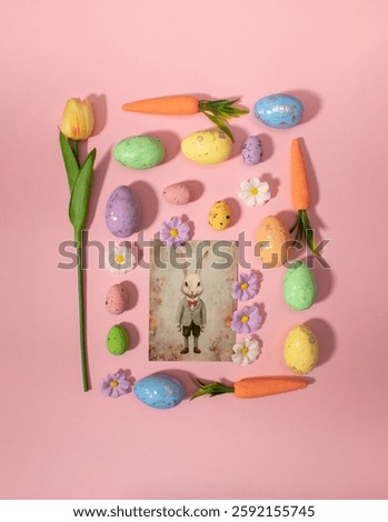 Easter pattern squer shape made of colorful flowers, eggs and carrots. Minimal holiday concept. Flat lay pattern.