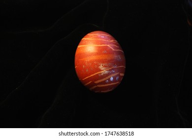 Easter red egg. Macro photo. Ritual food for Easter.