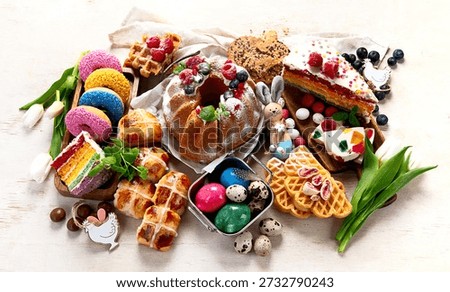 Easter or spring dessert  assortment of breads, desserts and treats on a light background. Top view.
