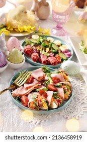 Easter Table With Fresh Salads With Salami And Ham Cones Filled With Egg And Vegetable Salad