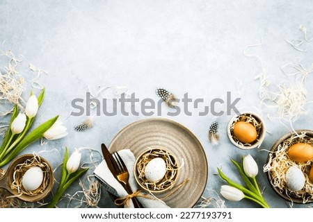 Similar – Image, Stock Photo Table setting for Easter dinner with mimosa