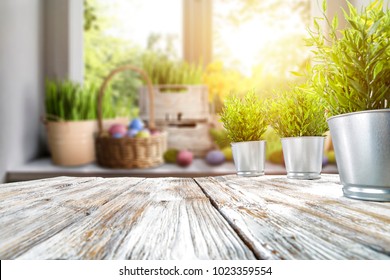 Easter table with spring flowers in a sunny April kitchen - Shutterstock ID 1023359554
