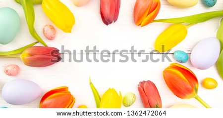 Similar – Image, Stock Photo From above of Easter-themed flatlay featuring a nest with speckled eggs, surrounded by soft feathers and pussy willow branches on a textured background